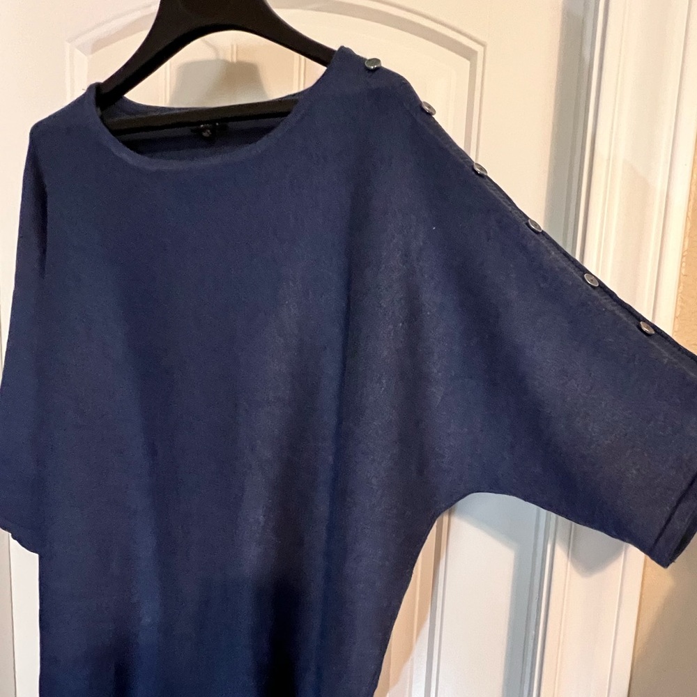 Navy blue sweater with sleeve button details